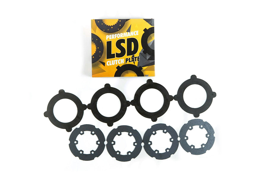 RacingDiffs LSD clutch pack for Porsche Boxster and Cayman manual gearbox showing friction discs, steel plates, and packaging.